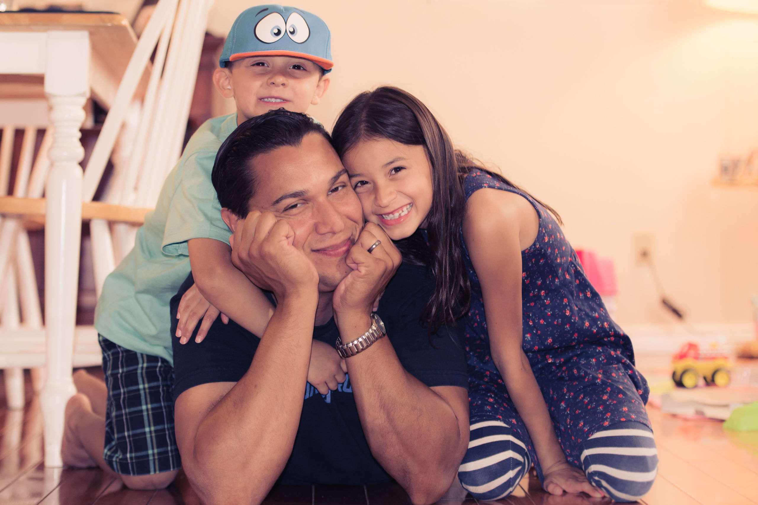 Latinx family having fun posing for camera.